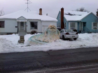 Illustration for article titled These geeky snowmen turn their yards into a weirder winter wonderland